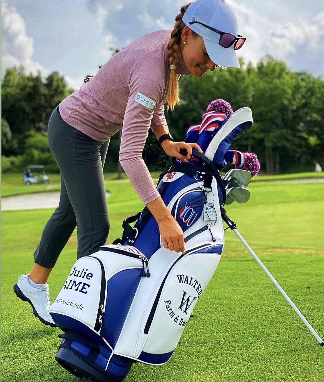 Custom logo ladies golf bag on the golf course, personalised with player's name and sponsor logo