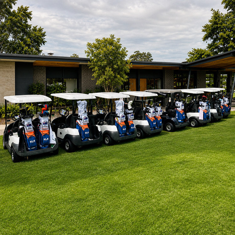 bulk order corporate custom cart golf bags in front of golf club house